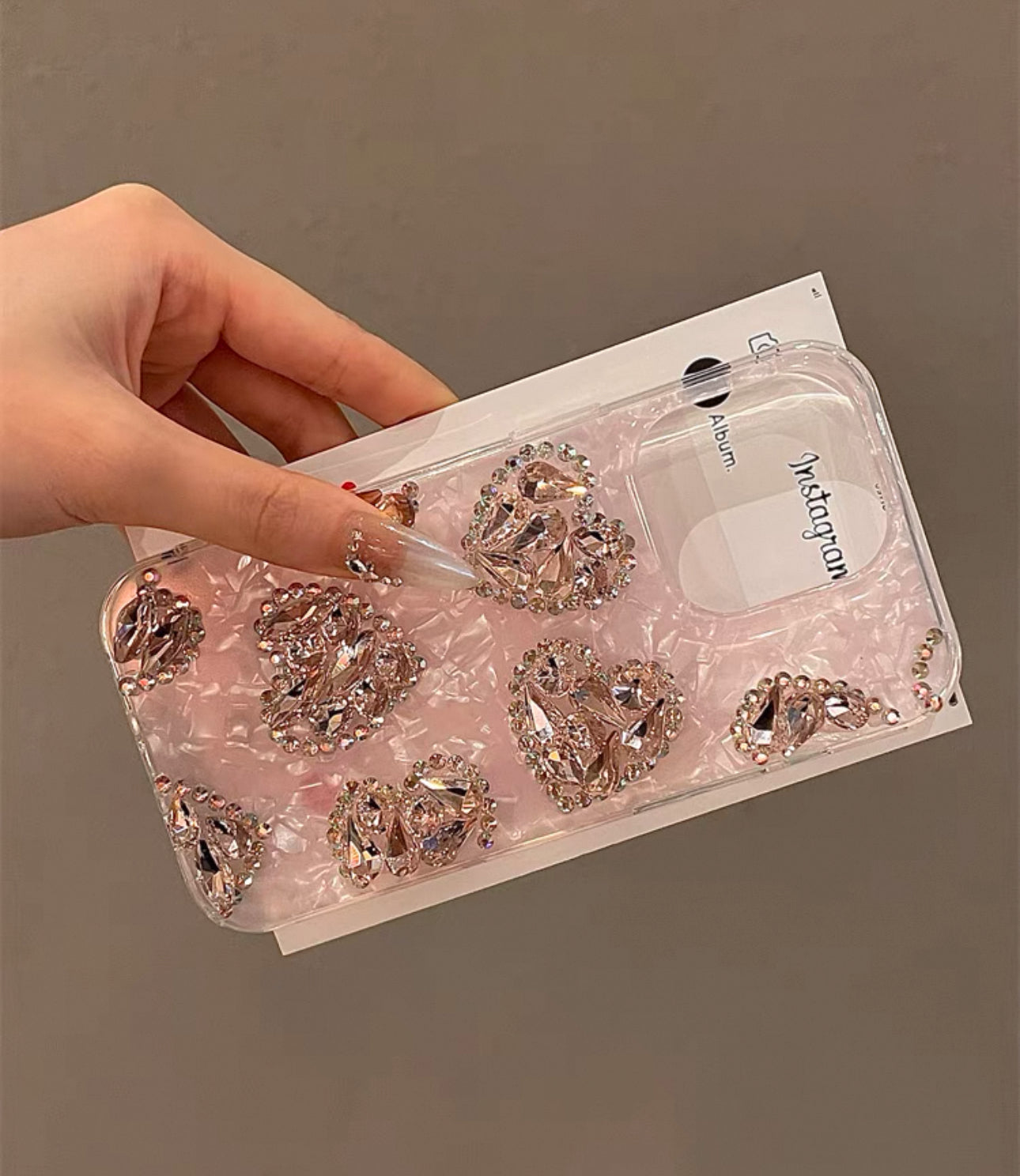 Pink shell pattern heart-shaped case for iPhones