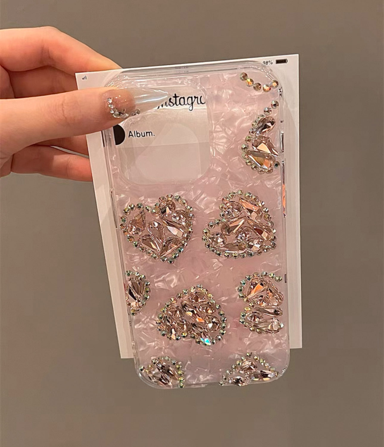 Pink shell pattern heart-shaped case for iPhones