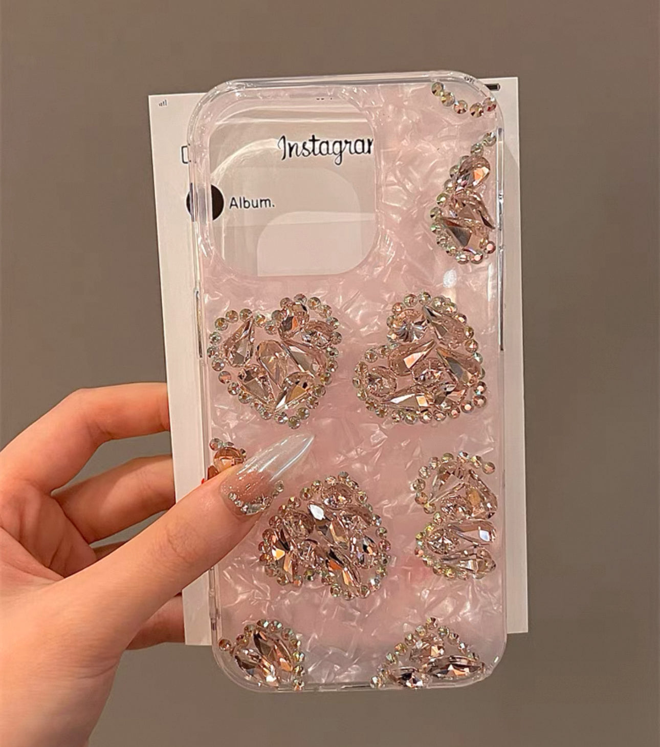 Pink shell pattern heart-shaped case for iPhones