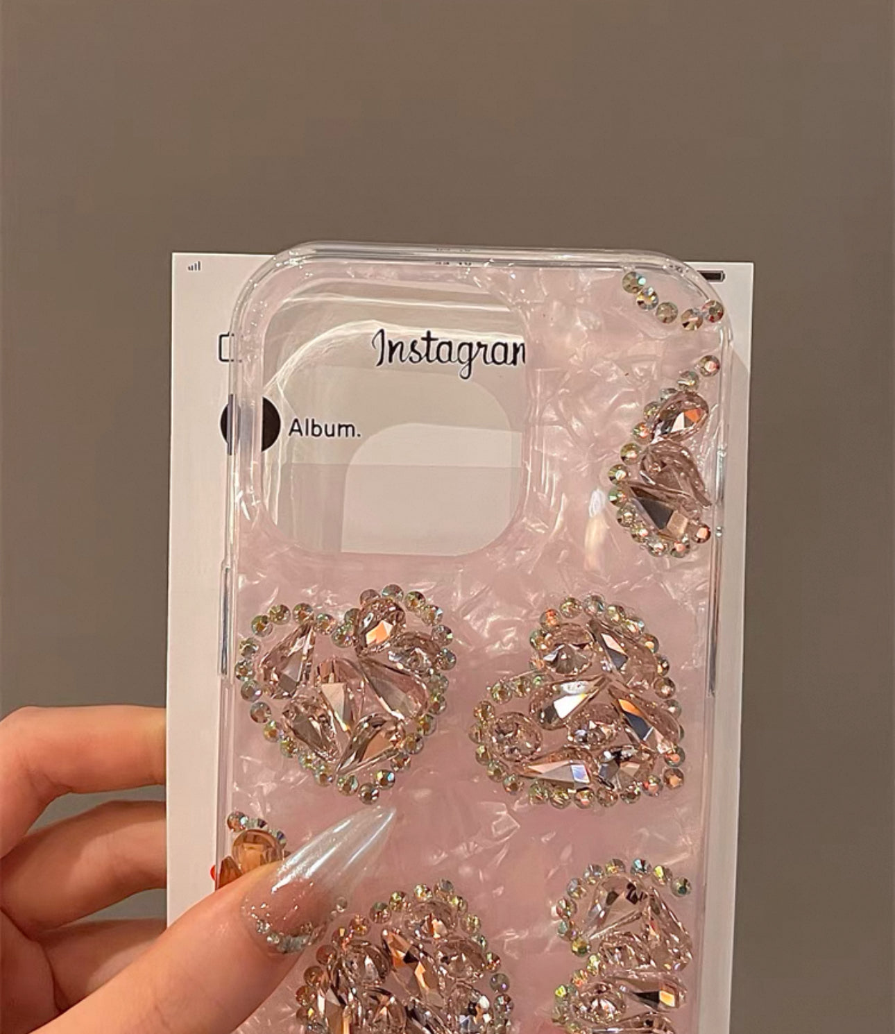 Pink shell pattern heart-shaped case for iPhones