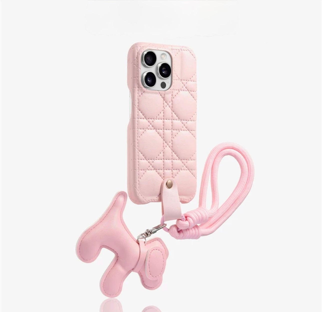 Quilted phone case with dog-shaped charm