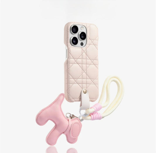Quilted phone case with dog-shaped charm