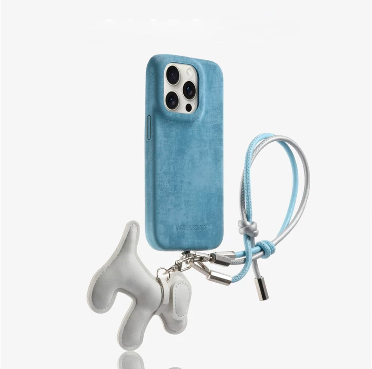 Suede phone case with dog-shaped charm